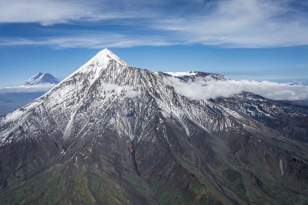 Ostry Tolbachik is a dormant stratovolcano with a destroyed peak. The Plosky Tolbachik is a stratovo...