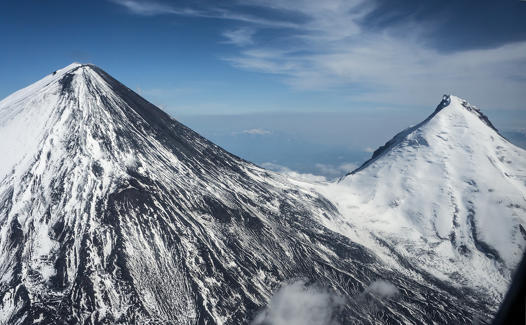 It is located 60 kilometers (37 miles) far from the Kamchatsly Gulf of the Pacific Ocean. The volcan...