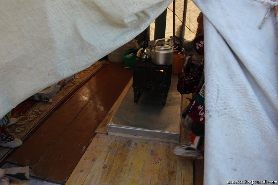 That day we had our breakfast in a raw-hide tent. We are entering the raw-hide tent.